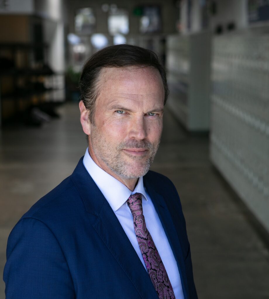 Dr. Conrad Hughes